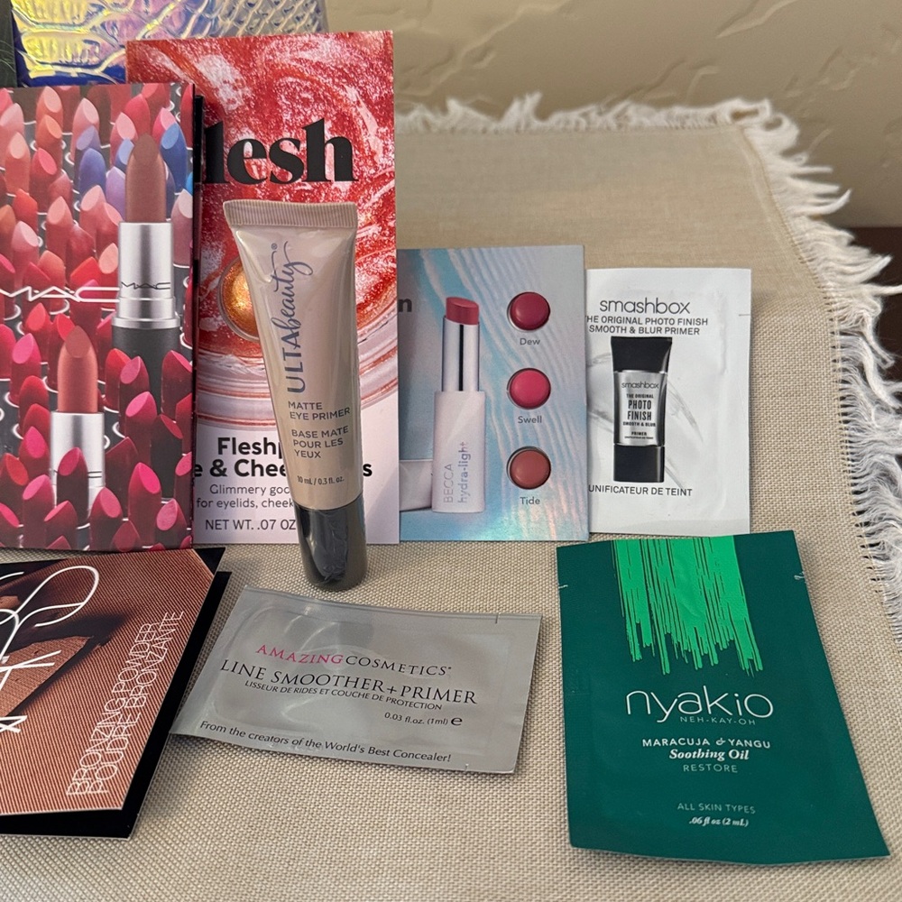 Holographic snake embossed case with samples/travel size skin care & makeup. - Picture 4 of 8